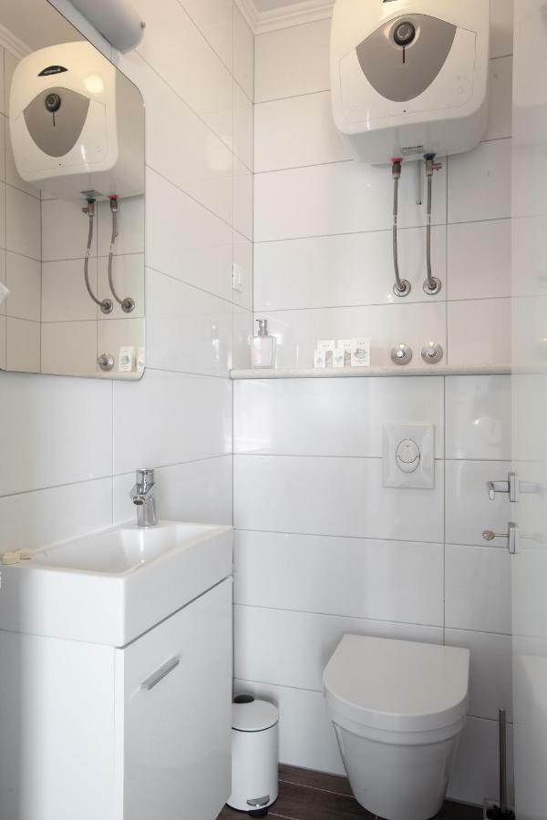 Kvasina Apartments Zadvarje Luaran gambar